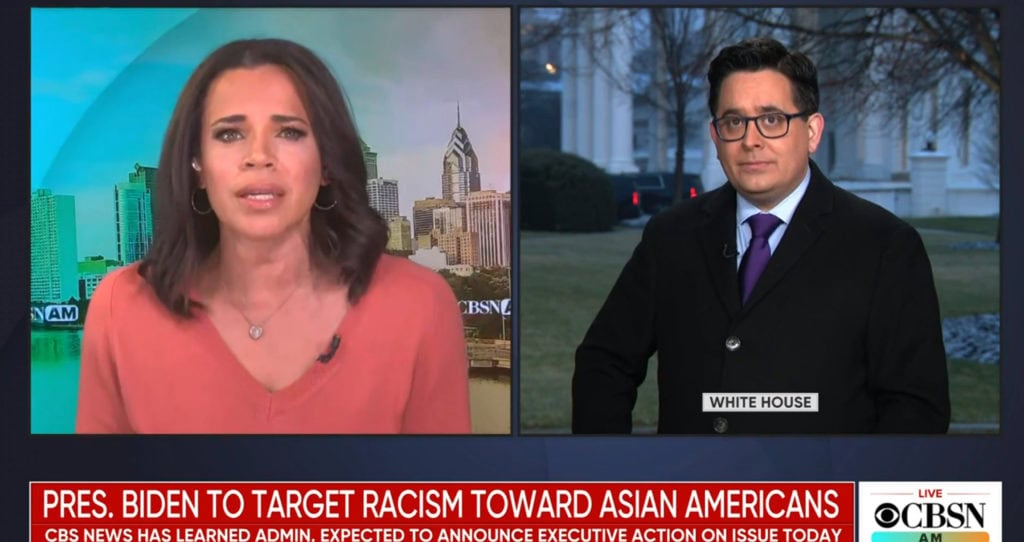 Two CBS News Anchors discuss President Biden's anticipated executive order. Headline: "President Biden to Target Racism Toward Asian Americans
